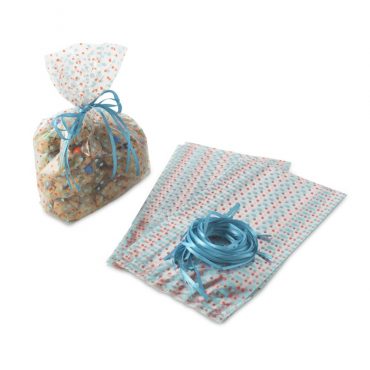 Clear celophane bags with red and blue dots, blue ribbon with baked goods