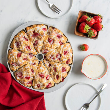 strawberry scones made with Nordic Ware aluminum scone and cornbread baking pan with 8 triangular wedge-shaped cavities