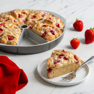 strawberry scones made with Nordic Ware aluminum scone and cornbread baking pan with 8 triangular wedge-shaped cavities