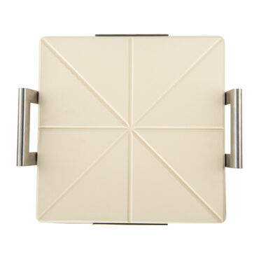 Nordic Ware square pizza stone showing textured bottom surface with metal cooling rack underneath