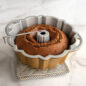 Reusable Bundt® Cake Thermometer on done baked Bundt cake in Bundt pan