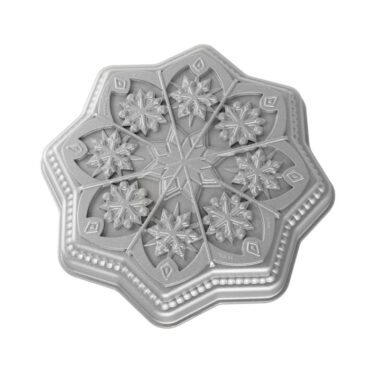 Nordic Ware aluminum shortbread pan with six detailed snowflake-shaped cavities, natural silver finish
