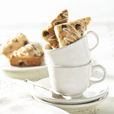 baked scones stacked in coffee cup
