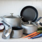 Cookware set in kitchen setting, including 1.5 Qt Sauce Pan