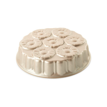 Nordic Ware aluminum pineapple upside-down cake pan with molded pineapple ring and cherry indentations