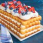 4 layer loaf cake, whipped cream filling and topping, fresh berries
