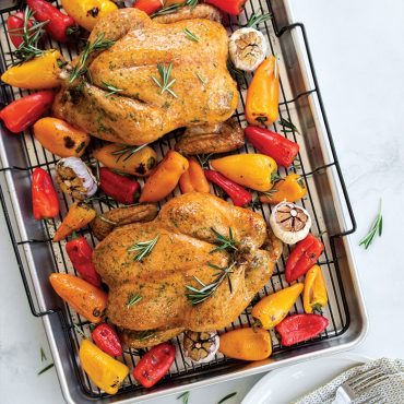 Two baked whole chickens and vegetables on Extra Large Oven Crisp Baking Tray