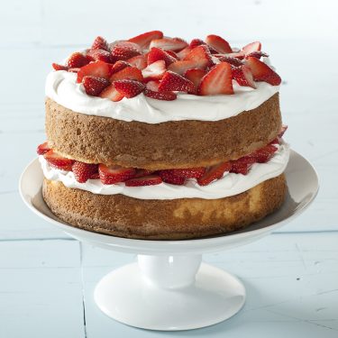 Golden Layer Cake with Strawberries & Whipped Cream