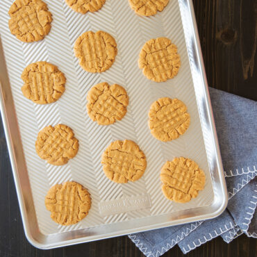 Baked peanut butter cookies on Prism sheet