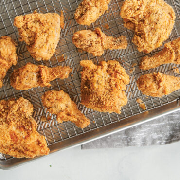 fried chicken cooling on nordic ware wire grid rack