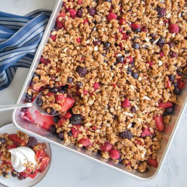 Golden berry crisp with nuts and dried fruit baked in Nordic Ware aluminum high-sided sheet cake pan