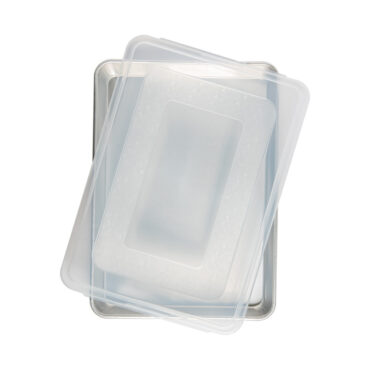 Nordic Ware aluminum high-sided sheet cake pan with clear plastic lid, natural silver finish