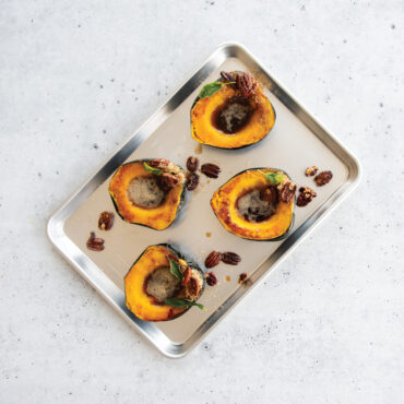 Nordic Ware aluminum jelly roll pan with baked squash and nuts