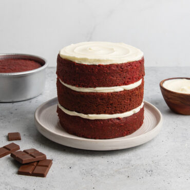 three layer frosted cake baked with nordic ware 6in round layer cake pan
