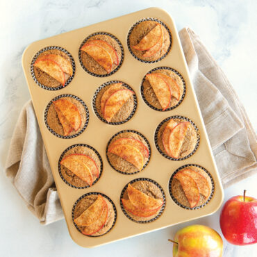 Naturals® Nonstick 12 Cavity Muffin Pan with Apple muffins