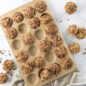 Naturals® Nonstick 24 Cavity Petite Muffin Pan with granola muffins