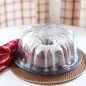 Baked glazed Bundt® cake in cake keeper