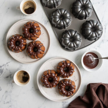 chocolate covered buntlette cakes made with nordic ware classic bundtlette cake pan