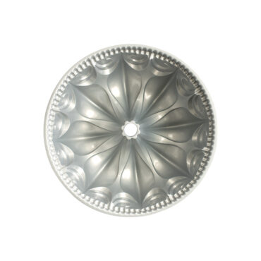 Nordic Ware aluminum Fleur De Lis bundt pan interior showing ornate fluted design with decorative rim