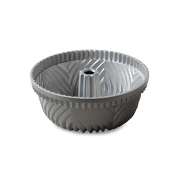 Nordic Ware Bavaria Bundt pan with ornate fluted design, dark graphite exterior and silver nonstick interior