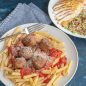Close-up of Plate with pasta, spaghetti sauce and meatballs