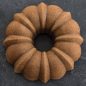 Top view of baked Cinnamon Spice Anniversary BundtÂ® cake
