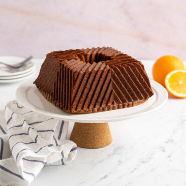 Plain Bundt Squared cake on white cake stand