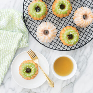 Six-cavity Nordic Ware Anniversary Bundtlette pan, cast aluminum with detailed fluted wells, natural silver finish