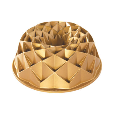 Nordic Ware aluminum Jubilee bundt pan with geometric diamond pattern design, gold-colored finish