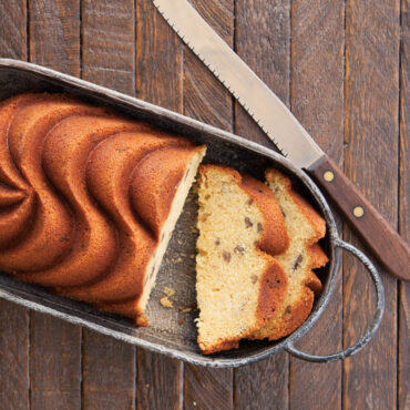 Golden vanilla loaf cake with decorative ridged pattern
