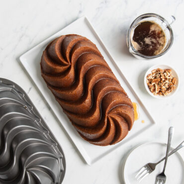 loaf cake baked with Nordic Ware Heritage aluminum loaf pan with decorative twisted spiral design, dark nonstick finish