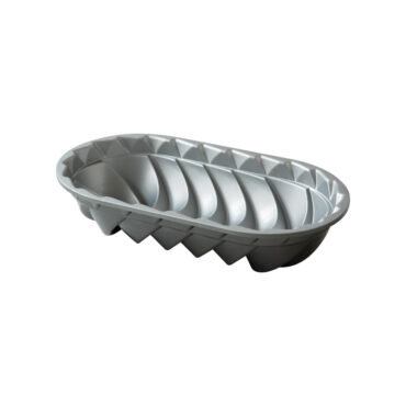 Nordic Ware Heritage aluminum loaf pan interior showing decorative swirl pattern, silver finish