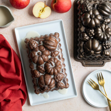 Plated glazed Harvest Bounty loaf with apples and pan