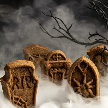 Close up Mysterious Tombstones cakes with smoke in background
