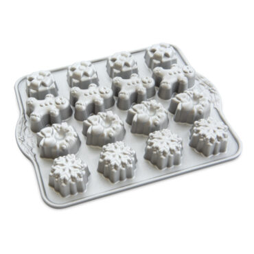 Nordic Ware aluminum teacakes pan with 16 mini holiday-shaped cavities including presents, gingerbread men, wreaths, snowflakes