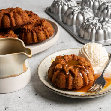 mini wreath cakes from Nordic Ware Wreathlettes pan plated with scoop of ice cream and caramel