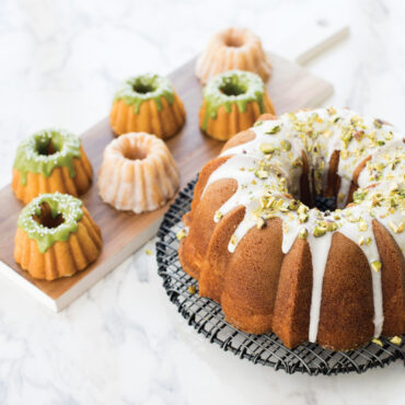Nordic Ware Anniversary Bundtlette pan, cast aluminum with intricate fluted design, silver finish, mini bundt mold