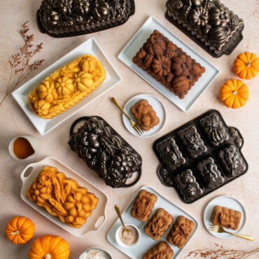 Group image of Fall Harvest loaf pans and cakes in autumn scene