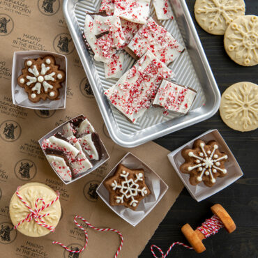 Stamped cookies and holiday treats in gifting scene