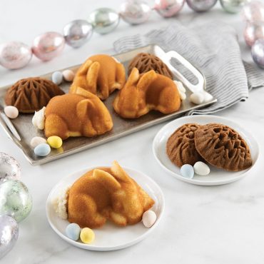 Baked bunny and ornamental egg cakelets on platter, two plated