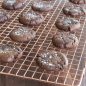 Baked chocolate cookies on cooling rack