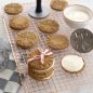 Baked stamped cookies on copper grid, cookie stamps