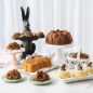 Easter baking display including baked Easter basket cakes