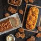Montage of fall harvest cakes - apple loaf sliced, pumpkin wheat loaf, spice leaves and granola bite leaves