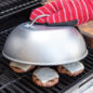 Melting cheese on burgers using dome lid on grill