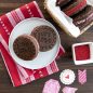 Baked chocolate stamped cookies sandwiches, Valentine's Day scene