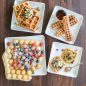 4 different style waffles with a variety of toppings