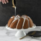 75th Anniversary Braided Bundt®  with white glaze poured over it