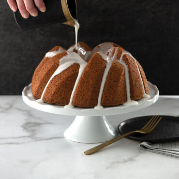 Baked 12 cup braided Bundt cake with white glazw