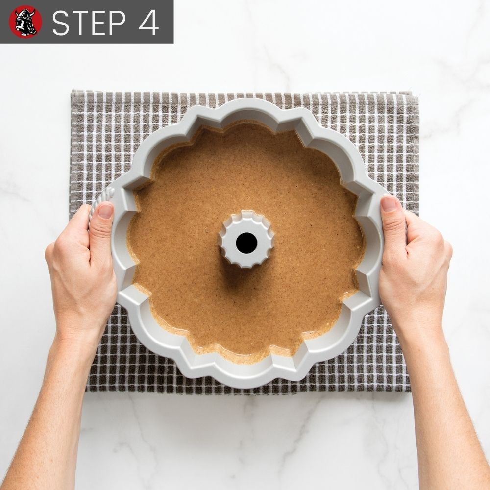 Step 4 Tapping pan with batter on counter top